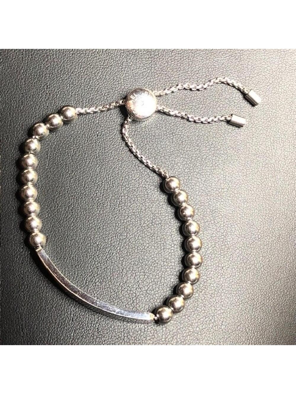 9312 Michael Kors Adjustable Silver Tone Beaded Bracelet with Logo Bar